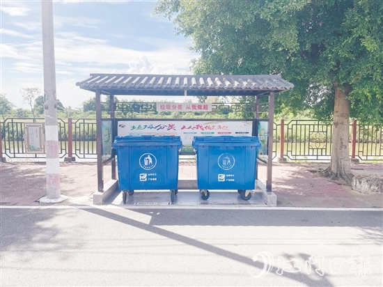 古井鎮(zhèn)洲朗村垃圾收集點升級改造后，變得干凈整潔。
