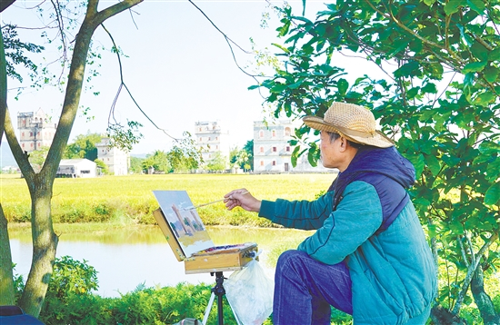 海內(nèi)外美術(shù)家在塘口鎮(zhèn)自力村碉樓群寫生。